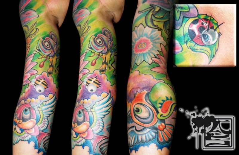 Colorful Nature Inspired Sleeve Tattoo - Balinese Tattoo Miami